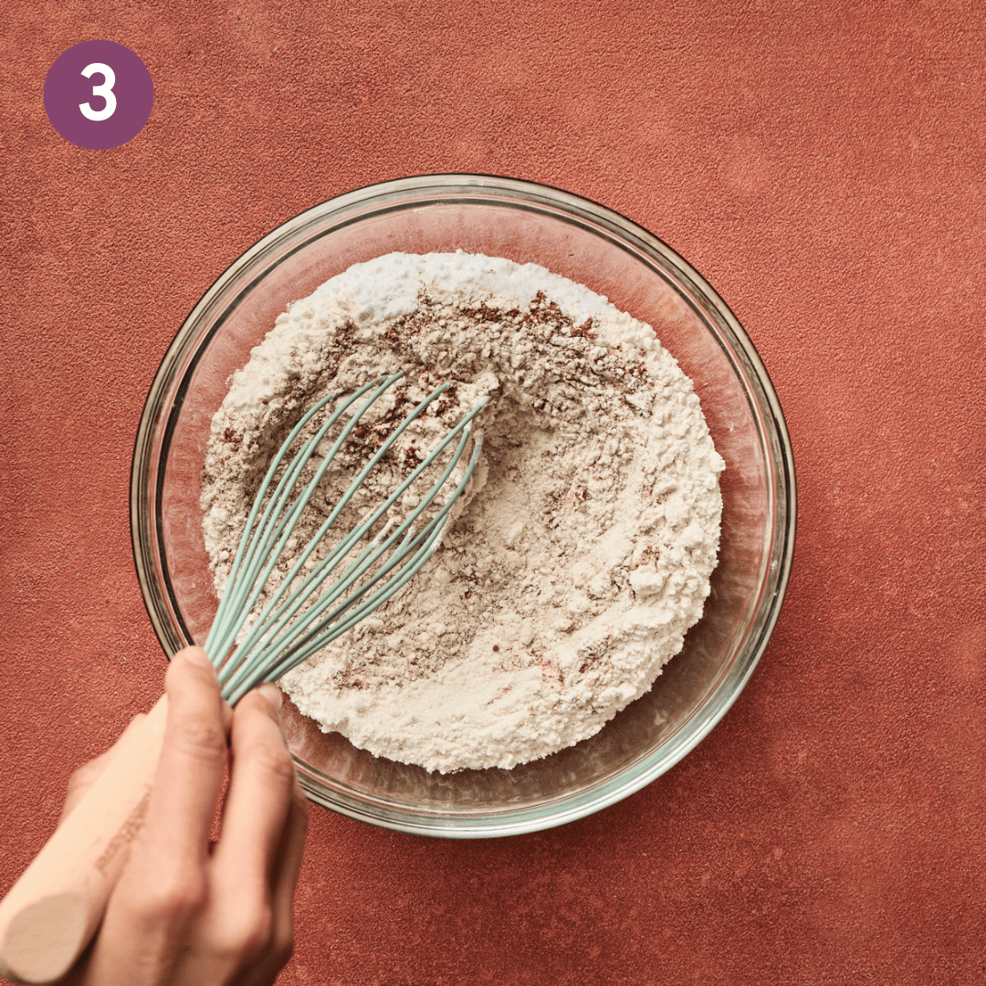 Dry ingredients in a large glass bowl.