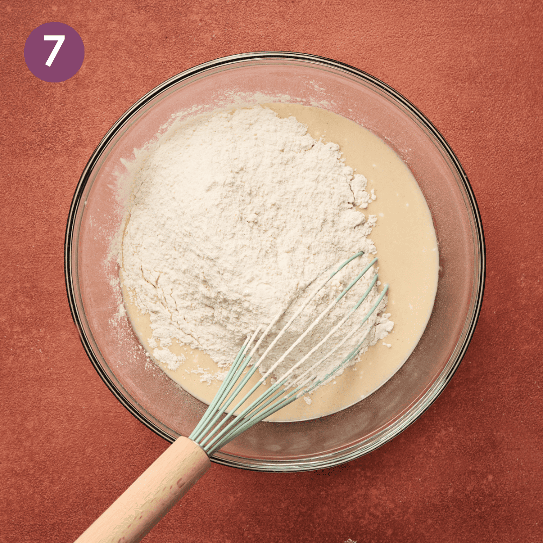 dry and wet ingredients in glass bowl before being mixed together.