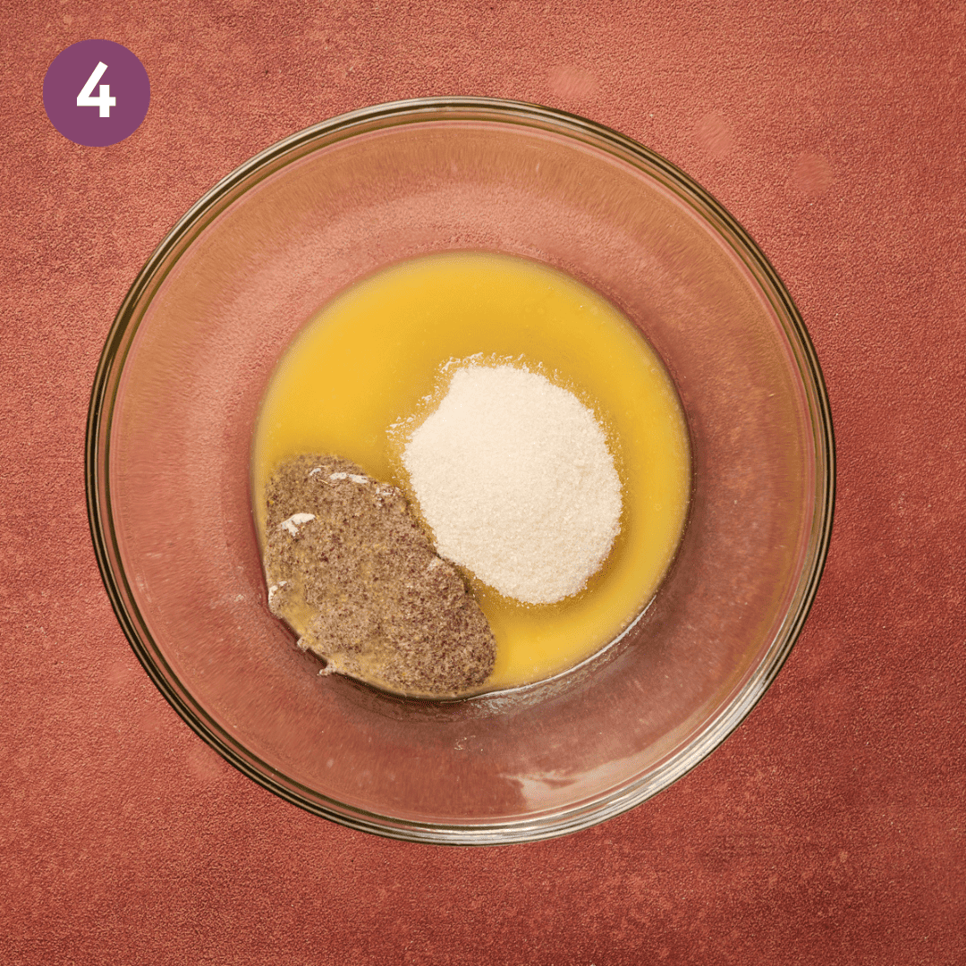 Vegan Butter, flax egg and sugar in a glass bowl.