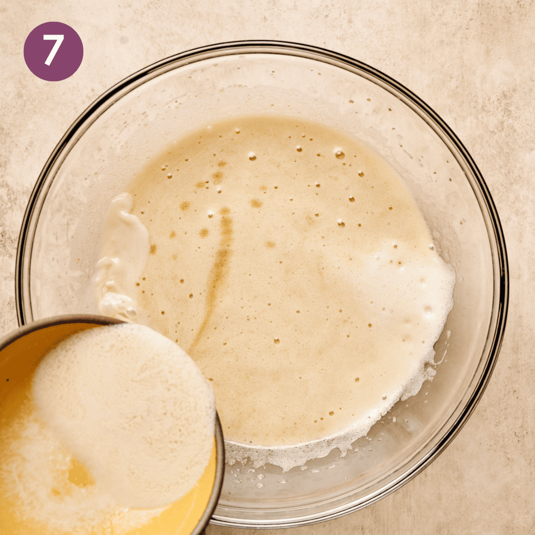 Buttermilk and vanilla being added to the sugar aquafaba mixture.