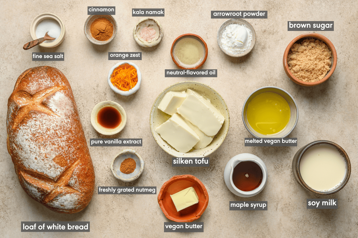 vegan french toast ingredients in various small bowls on a table.